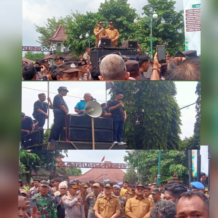 Senin (29/9/2025). Ratusan massa dari Pasukan Slamet Wahidin (PSW) kompak menyanyikan dan berjoget mengikuti irama slogan kampanye “Alus Dalane Kepenak Ngodene”. Aksi unik ini menjadi pembuka demonstrasi menagih janji kampanye pasangan Bupati–Wakil Bupati Fahmi Muhammad Hanif dan Dimas Prasetyahani.