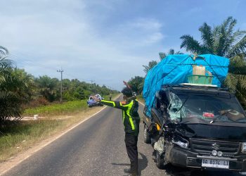 Personel Pos Km. 38 Unit Turjawali Satlantas Polresta Palangka Raya merespons cepat laporan kecelakaan lalu lintas yang terjadi di Jalan Tjilik Riwut Km 48, Kecamatan Bukit Batu, Kota Palangka Raya, Jumat (23/1/2026) pagi.