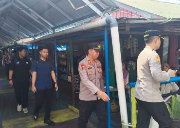 Polsek Sabangau Polresta Palangka Raya melaksanakan pengamanan di kawasan Wisata Air Hitam Sungai Sabangau, Kelurahan Kereng Bangkirai, Kecamatan Sabangau.