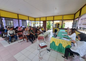 Bhabinkamtibmas Polsek Bukit Batu Polresta Palangka Raya menghadiri kegiatan penyuluhan akses reforma agraria yang dilaksanakan di Balai Basara, Jalan Marang, Kelurahan Marang, Kecamatan Bukit Batu