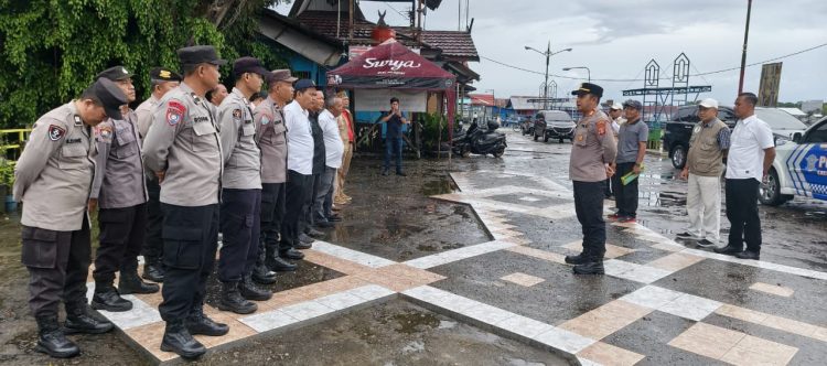 Polsek Pahandut Polresta Palangka Raya melaksanakan pengamanan kegiatan pengukuran tanah untuk pembangunan Posko Terpadu Gerakan Dayak Anti Narkoba (GDAN) di kawasan Jalan Rindang Banua Ujung (Puntun), Kelurahan Pahandut, Kecamatan Pahandut.