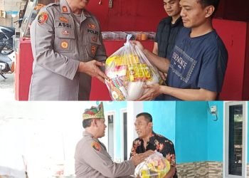 Kapolsek Kampar AKP Asdisyah Mursyid, SH menyerahkan bantuan sembako kepada warga yang terdampak angin puting beliung dalam kegiatan Bansos Jumat Barokah di Kecamatan Rumbio Jaya, Kabupaten Kampar, Jumat (03/04/2026). Bantuan yang diberikan Polsek Kampar bekerja sama dengan PT Green Palma tersebut bertujuan untuk meringankan beban masyarakat yang terdampak musibah.