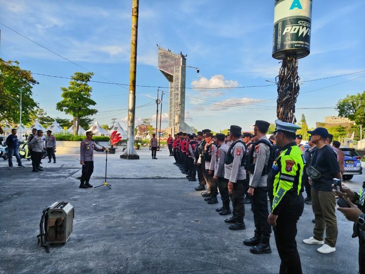 Pam dilakukan pada lokasi kegiatan yakni di area Bundaran Besar Kota Palangka Raya, Kalimantan Tengah, yang dikomando oleh Kabagops, Kompol Henry, S.E. selaku koordinator tugas, Sabtu (23/5/2026) sore.