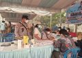 Polsek Pahandut melalui Bhabinkamtibmas Kelurahan Menteng, Aiptu Siswanto, mendampingi penyaluran bantuan pangan dari Gubernur Kalimantan Tengah bagi warga terdampak kebakaran hutan dan lahan (karhutla)