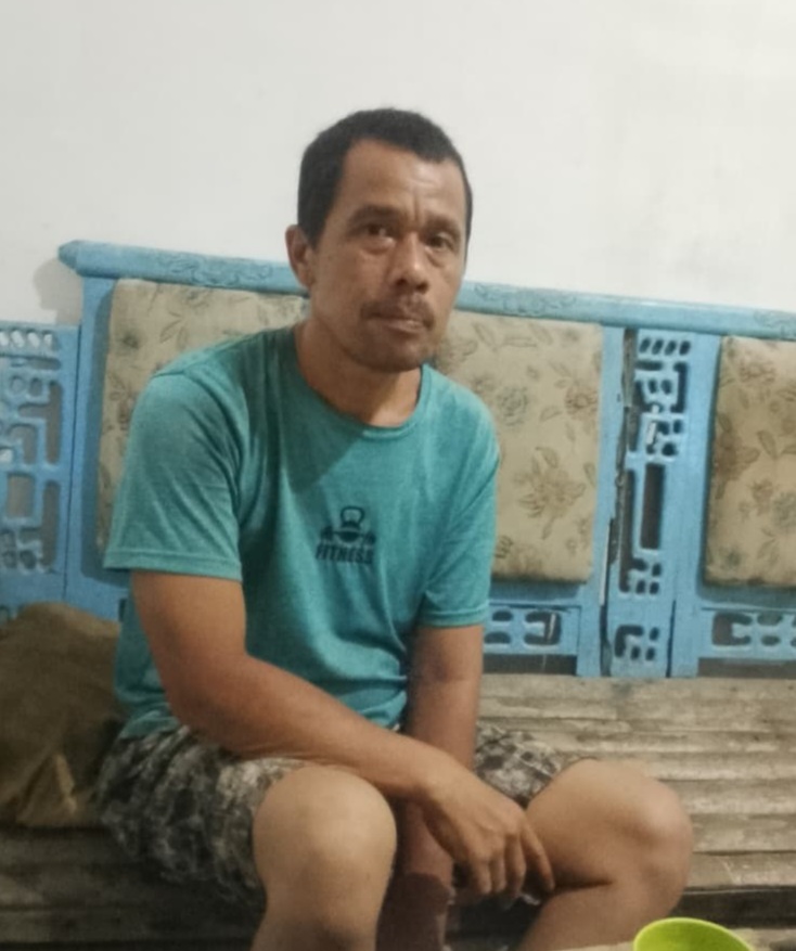 Aladin Panggabean (45), warga Dusun 6, Desa Perkebunan Aek Loba, Kecamatan Aek Kuasan, Kabupaten Asahan, Sumatera Utara.