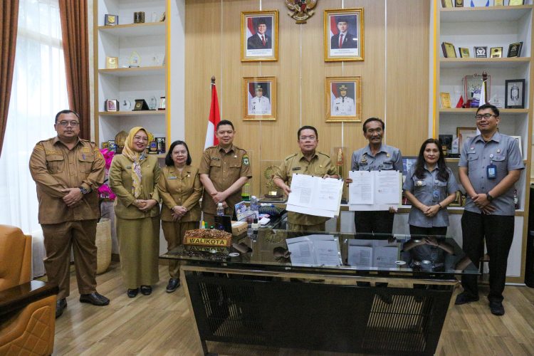 Pemko Pematangsiantar dan Kantor Wilayah Kemenkum Sumut Menandatangani Kerja Sama Pelayanan dan Pembangunan Hukum di Daerah