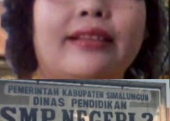 Kepsek SMP Negeri 2 Tapian Dolok, Rosita Damanik dan plang sekolah
