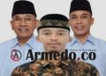 Pangulu Nagori Bah Kisat, Andri Dwi Rahmansyah dengan latar belakang Bupati dan Wakil Bupati Simalungun