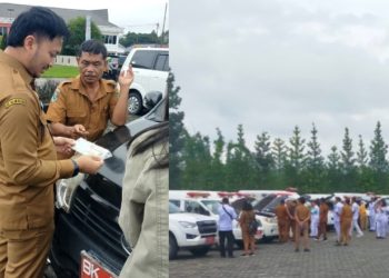 Kepala BPKAD Simalungun saat melakukan pemeriksaan STNK kendaraan dinas