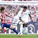Atletico Madrid mengalahkan Real Madrid 2-1 dalam lanjutan Liga Spanyol. Kartu merah Dean Huijsen menjadi titik balik pertandingan.